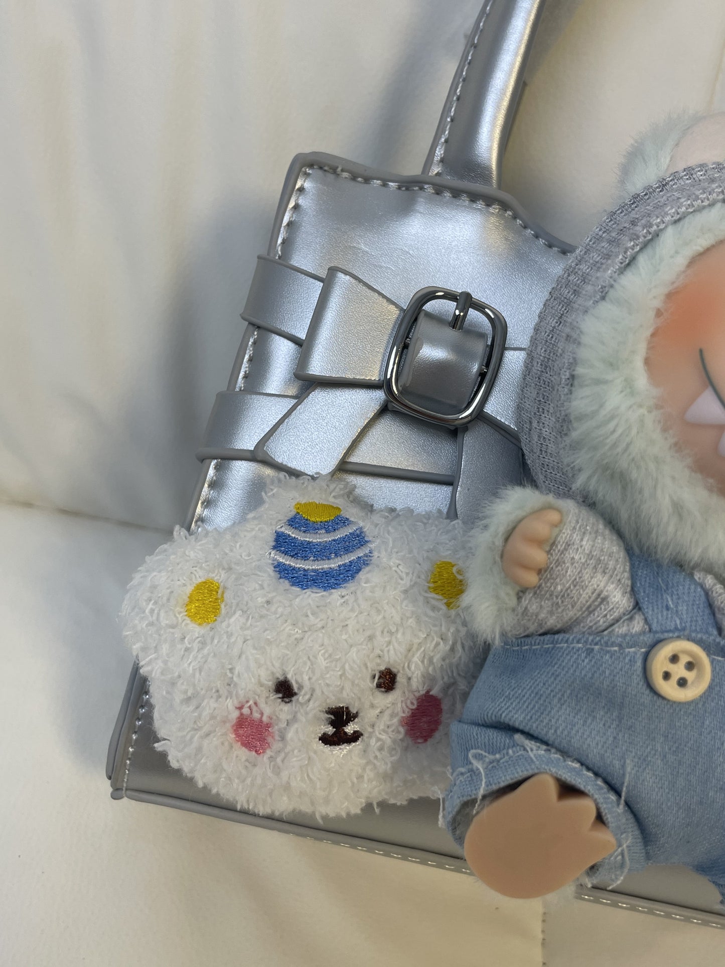A fluffy stuffed toy bag with a JoJo exclusive feel!