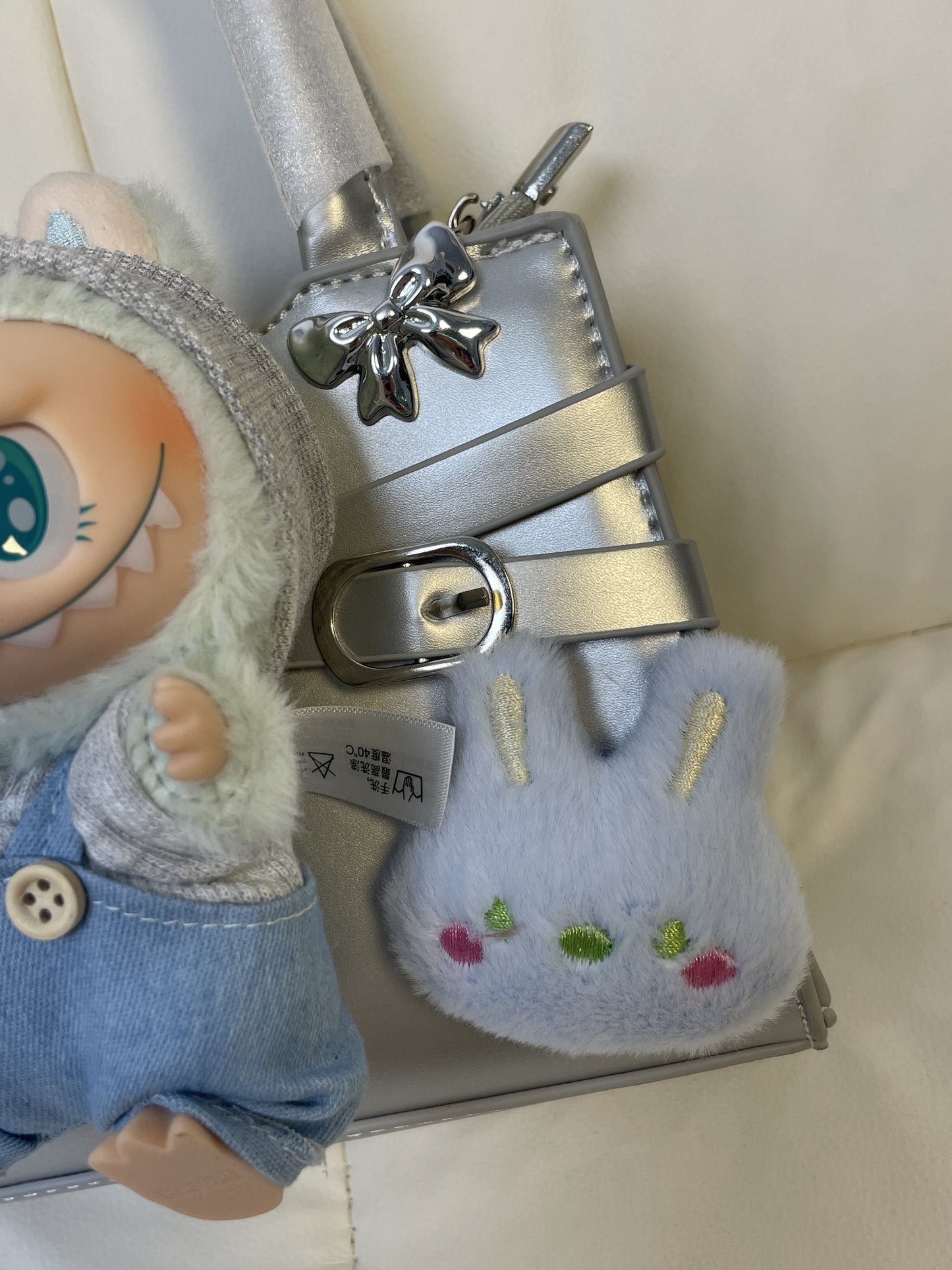 A fluffy stuffed toy bag with a JoJo exclusive feel!