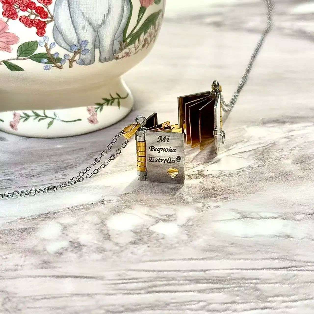 Best Mom Ever Book Necklace—the perfect gift choice for Mother's Day. Featuring a charming book-style design, it is meticulously crafted from rust-resistant 316 titanium steel—an ideal gift for Mom, a daughter, a son, or a loved one.
