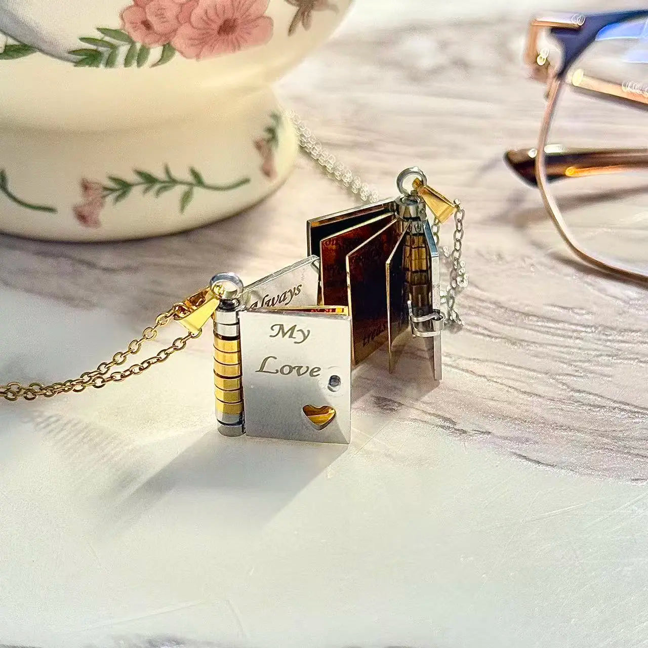 Best Mom Ever Book Necklace—the perfect gift choice for Mother's Day. Featuring a charming book-style design, it is meticulously crafted from rust-resistant 316 titanium steel—an ideal gift for Mom, a daughter, a son, or a loved one.