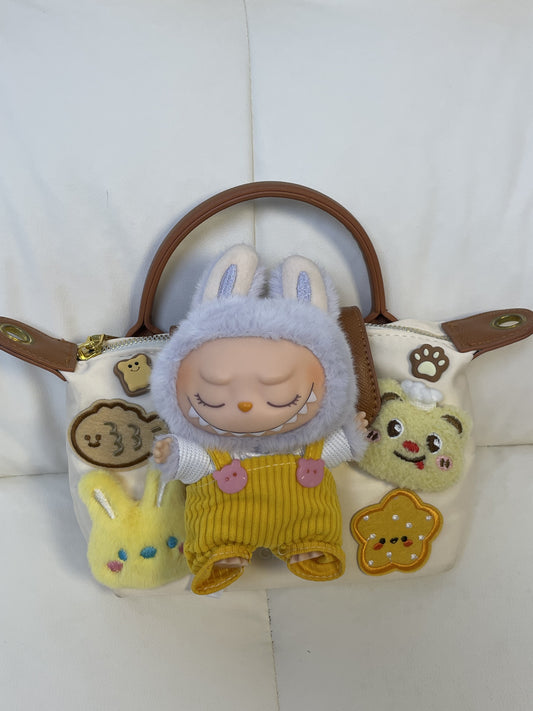 JoJo Be the center of attention with this super cute toy bag!